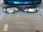 Zwarte Hella koplampen opel astra g in mooi staat, Auto-onderdelen, Ophalen of Verzenden, Opel