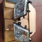 Koplampen  nissan navara  D40, Ophalen of Verzenden, Voor, Nissan