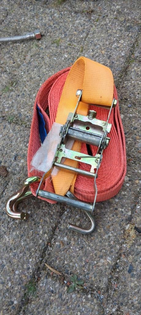 Spanriem met trekker, Ophalen