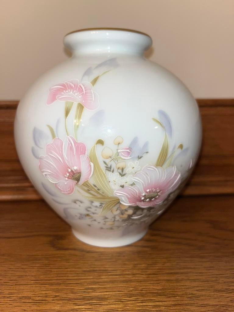 Porseleine vaas, Ophalen