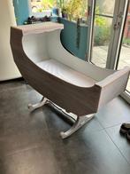Houten babybedje, Ophalen