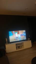Witte tv kast, Ophalen