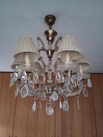 Antieke, kristallen luster beschikbaar voor biedingen
