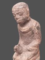 Orant en prière en bronze., Envoi