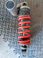 amortisseur arrière, Particulier