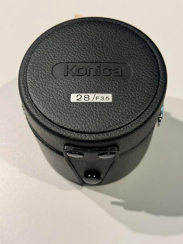 KONIKA HEXANON AR 28mm F 3.5 + zonnekap, Audio, Tv en Foto, Foto | Lenzen en Objectieven, Zo goed als nieuw, Groothoeklens