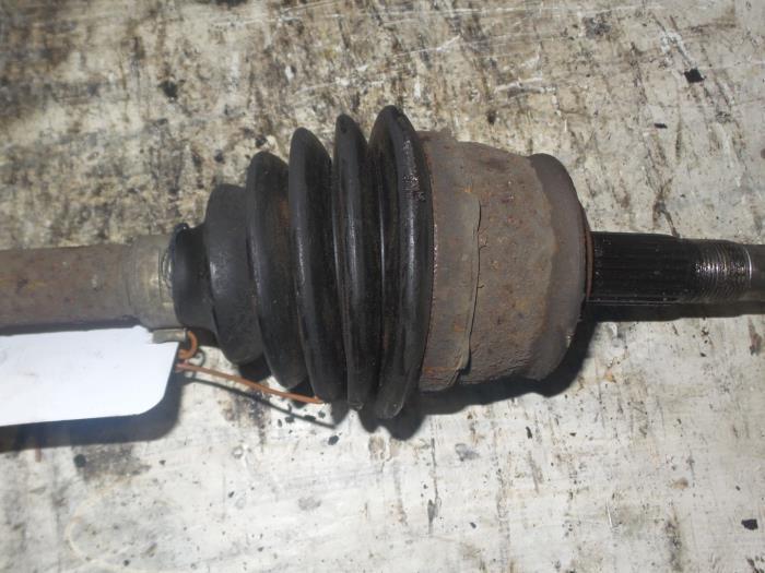 Aandrijfas links-voor van een Opel Corsa, Auto-onderdelen, Remmen en Aandrijving, Opel, Gebruikt, 3 maanden garantie, Ophalen of Verzenden