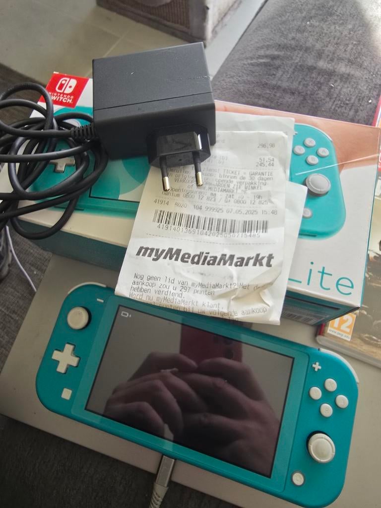 Switch lite met spellen te koop / ruil, Enlèvement, Turquoise, Comme neuf