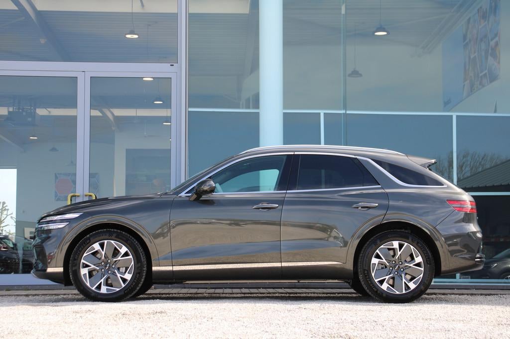 Genesis GV70 PURE 84 kWH Dual Motor AWD 490PK *FULL OPTION*, Auto's, Genesis, Automaat, 479 km, Leder, SUV of Terreinwagen