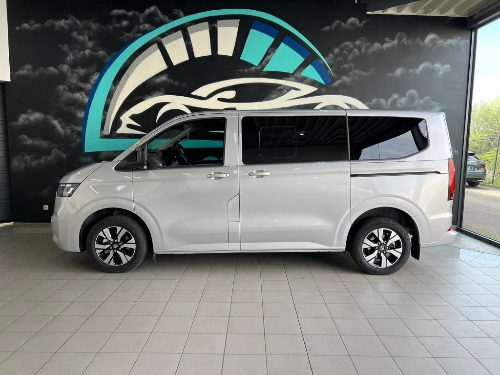 Volkswagen E-Caravelle / 9zitplaatsen / 305km rijbereik, Auto's, Volkswagen, Stof, 5 deurs, SUV of Terreinwagen, Zilver of Grijs
