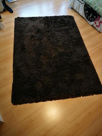 Tapis à poil long en parfait état 