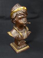 Antieke buste van rokend ventje, Ophalen