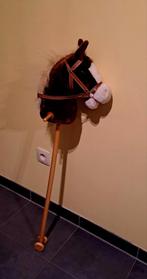 Stokpaardje met leiband en geluid., Enlèvement