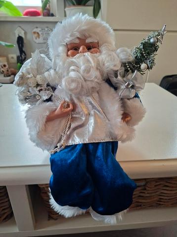 Kerst :  blauwe kerstman  beschikbaar voor biedingen