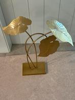 Goud metalen plantje, Ophalen