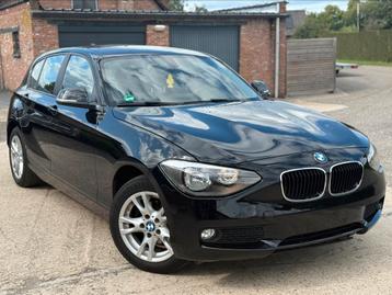 BMW 1 SERIE ✅ 1 REEKS 114i BENZINE AIRCO GARANTIE 1 JAAR beschikbaar voor biedingen
