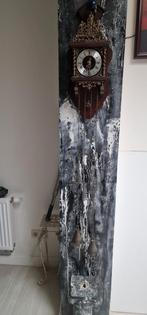 Antieke wandklok, Ophalen