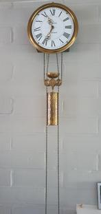 antiek klok, Ophalen