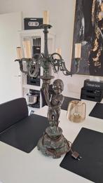Bronzen Beeld kandelaar, Ophalen