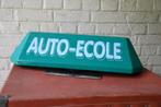 Frans auto rijschool bord, Ophalen