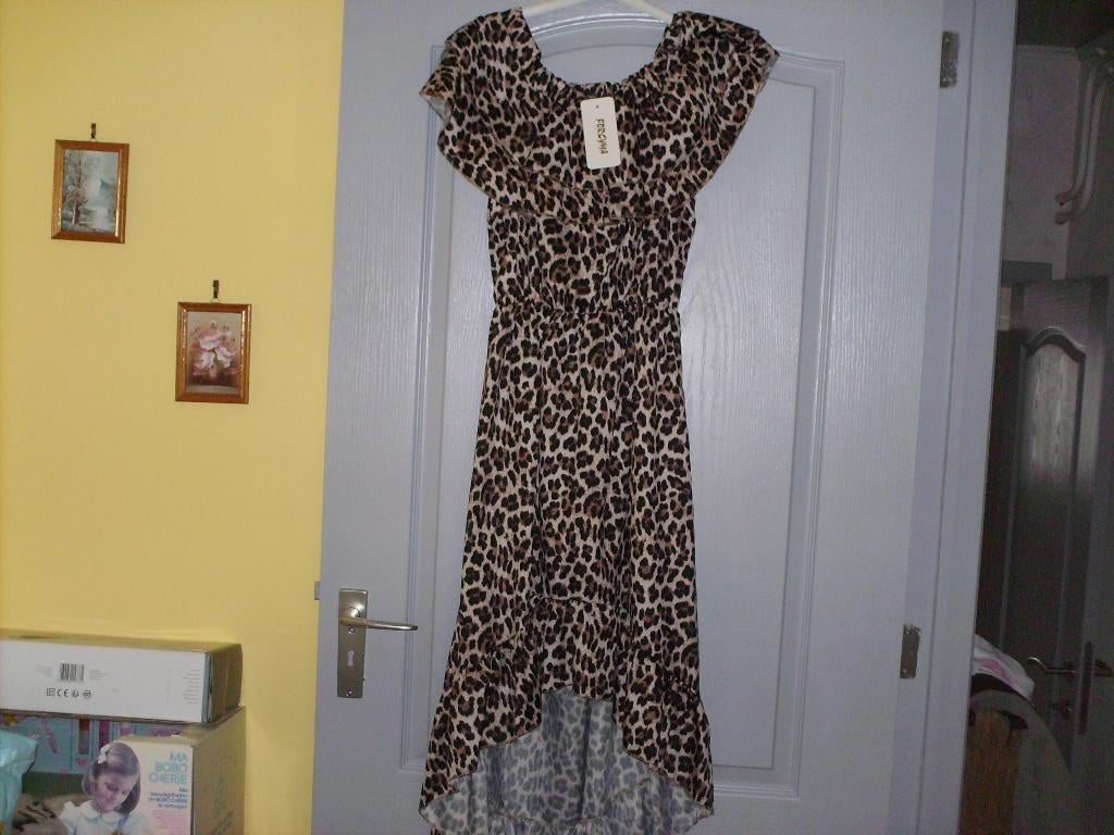 a vendre robe pour dame, Kleding | Dames, Jurken, Nieuw, Overige kleuren, Onder de knie, Ophalen of Verzenden