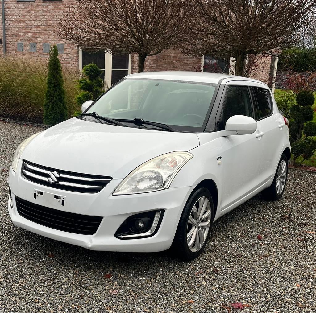 Suzuki Swift 1.3 Diesel 10/2016 . Garantie 12 mois, Auto's, Suzuki, Lederen bekleding, 4 cilinders, Bedrijf, 55 kW