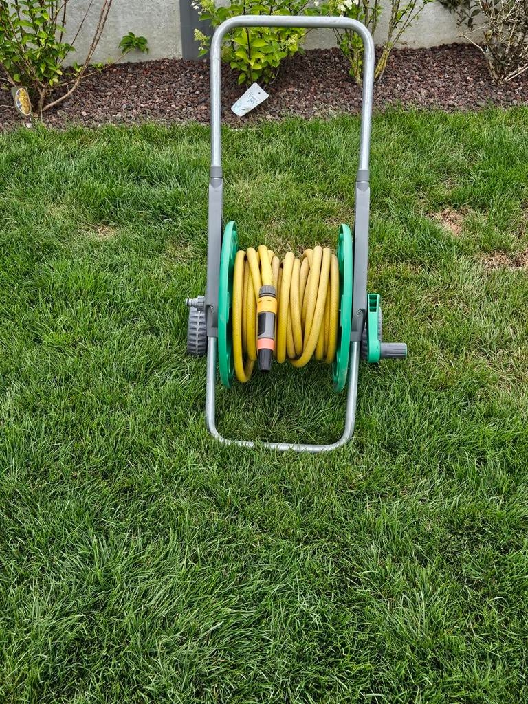 Haspel met tuinslang, Ophalen