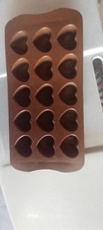 Pralinevorm, Ophalen