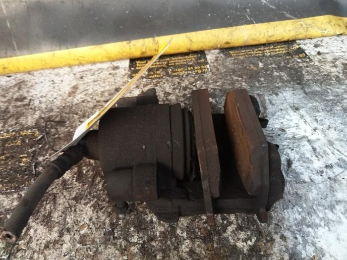 Remklauw (Tang) links-voor van een Volkswagen Polo, Auto-onderdelen, Remmen en Aandrijving, Volkswagen, Gebruikt, 3 maanden garantie