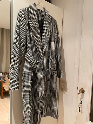 Manteau long beschikbaar voor biedingen