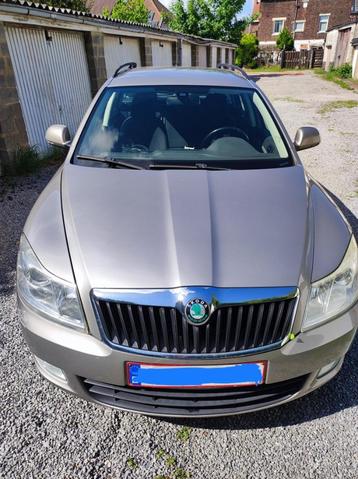 Skoda octavia break à vendre, Auto's, Skoda, Euro 5, Stof, Cruise Control, 1600 cc