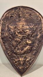 Koperen sierschild, Enlèvement