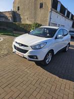 Hyundai ix35 2 litres essence boite auto / 180 000km, Auto's, Hyundai, Zwart, 4 cilinders, Leder en Stof, Wit