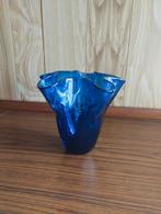 Blauwe vaas, Ophalen