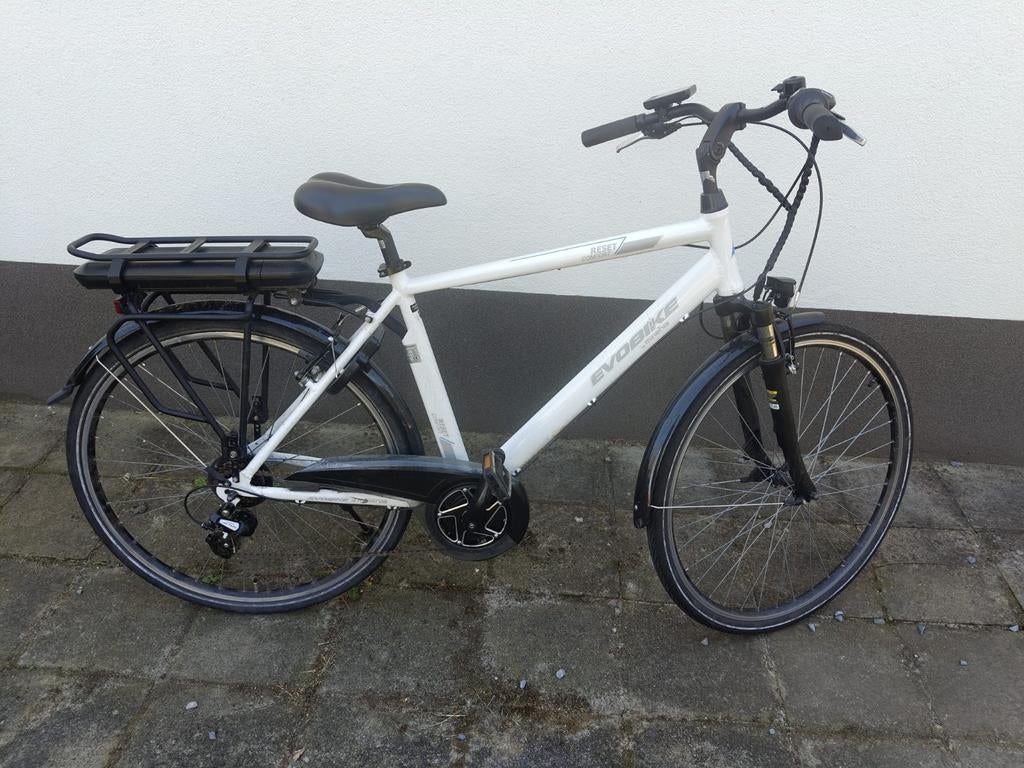 Elektrische herenfiets met middenmotor, 51 tot 55 cm, Ophalen, Zo goed als nieuw, 50 km per accu of meer