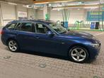 BMW 318i Touring Automaat Sport Line, Auto's, Achterwielaandrijving, Blauw, Leder, Particulier