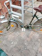 Oldtimer vrouwen fiets, Ophalen