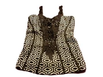 (60) - top femme t. 36 noir et blanc beschikbaar voor biedingen