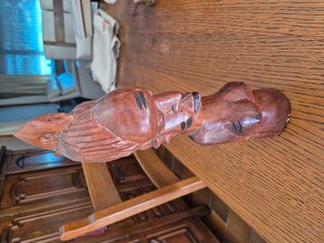 Statue africaine en bois, Enlèvement