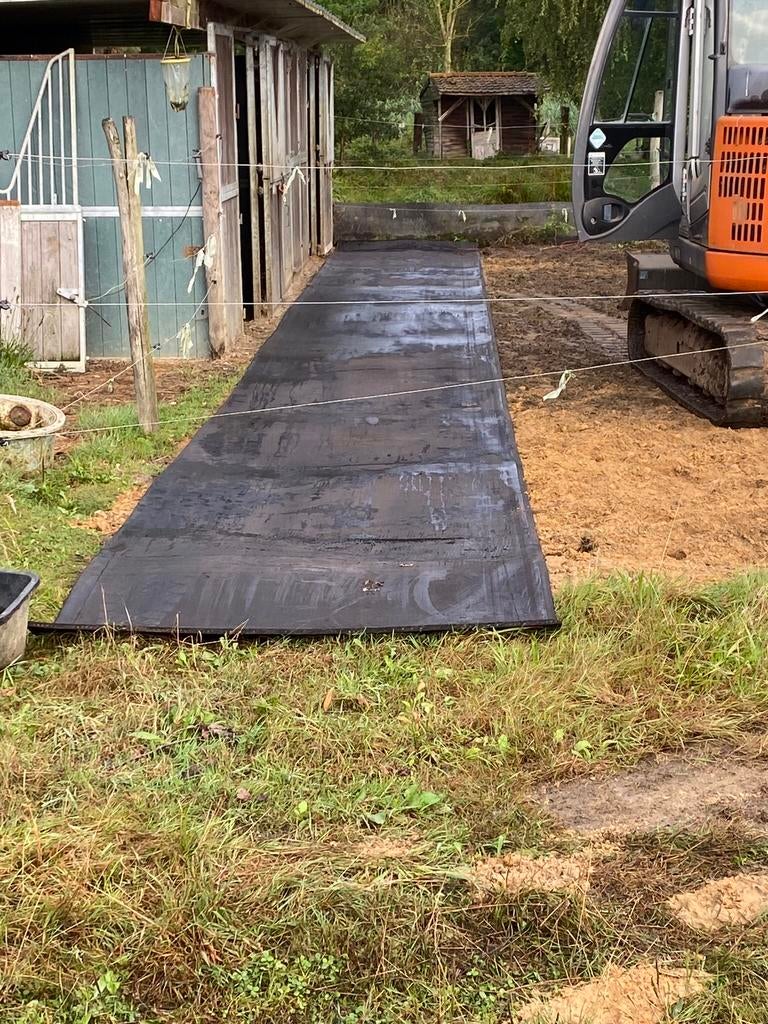 Slijk beu/ rubbermatten leggen