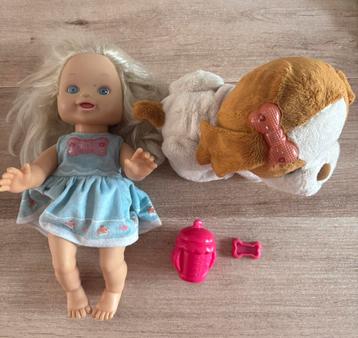 Sprekende pop Suzy met haar hond beschikbaar voor biedingen