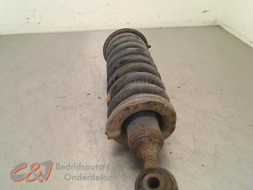 Schokdemper links-voor van een Nissan Navara, Auto-onderdelen, Ophanging en Onderstel, Nissan, Gebruikt, 3 maanden garantie, Ophalen of Verzenden