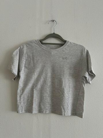 Lichtgrijze t-shirt H&M maat 146-152, Kinderen en Baby's, Kinderkleding | Maat 146, Meisje, H&M, Ophalen of Verzenden, Zo goed als nieuw
