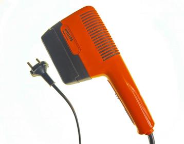 Vintage oranje haardroger Philips beschikbaar voor biedingen