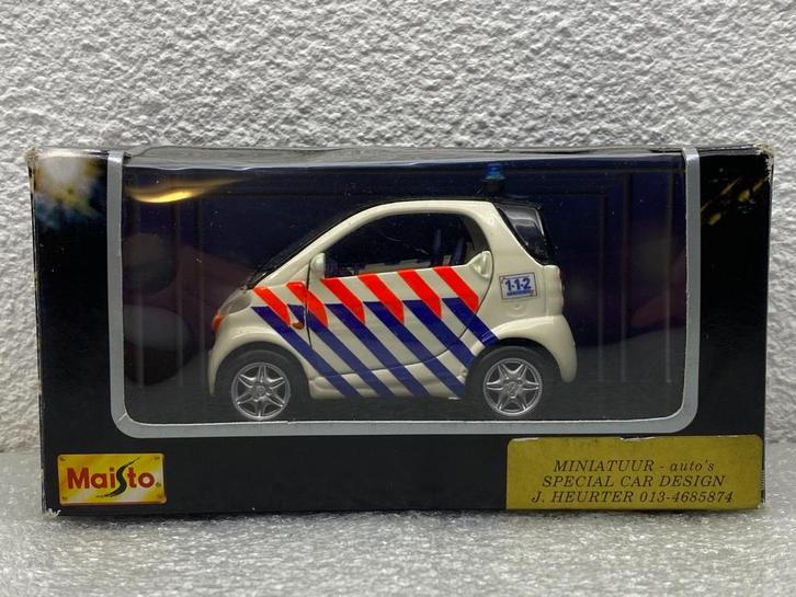 Smart City-Coupé (Politievoertuig Zuid-Nederland), Hobby en Vrije tijd, Modelauto's | 1:32, Nieuw, Auto, Overige merken, Ophalen
