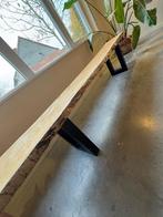 Rustieke bank met boomstam, Ophalen