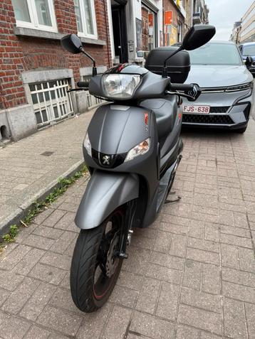 Peugeot twwet 125 met topkoffer 1 jaar garantie beschikbaar voor biedingen