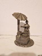 Figurine en étain " la marchande d'oranges ", Enlèvement