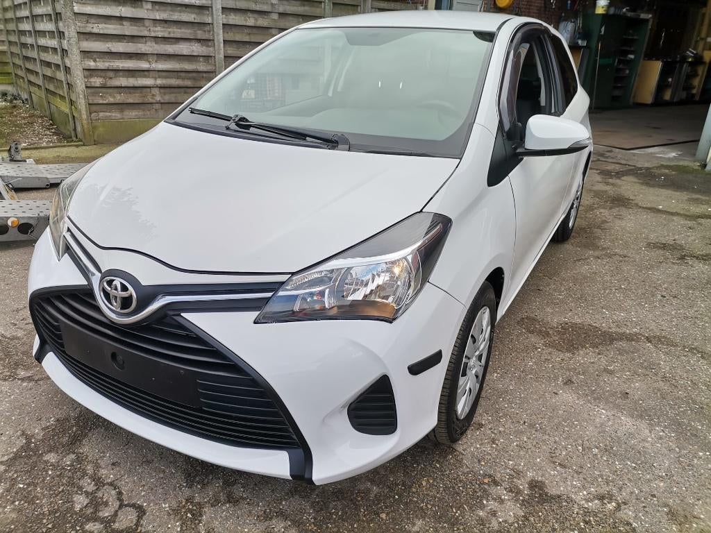 Toyota Yaris 1e eigennaar Airco,Navi, Voorwielaandrijving, Stof, Euro 6, Wit
