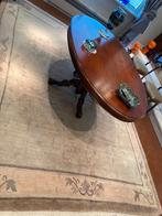 Wollen tapijt, Ophalen